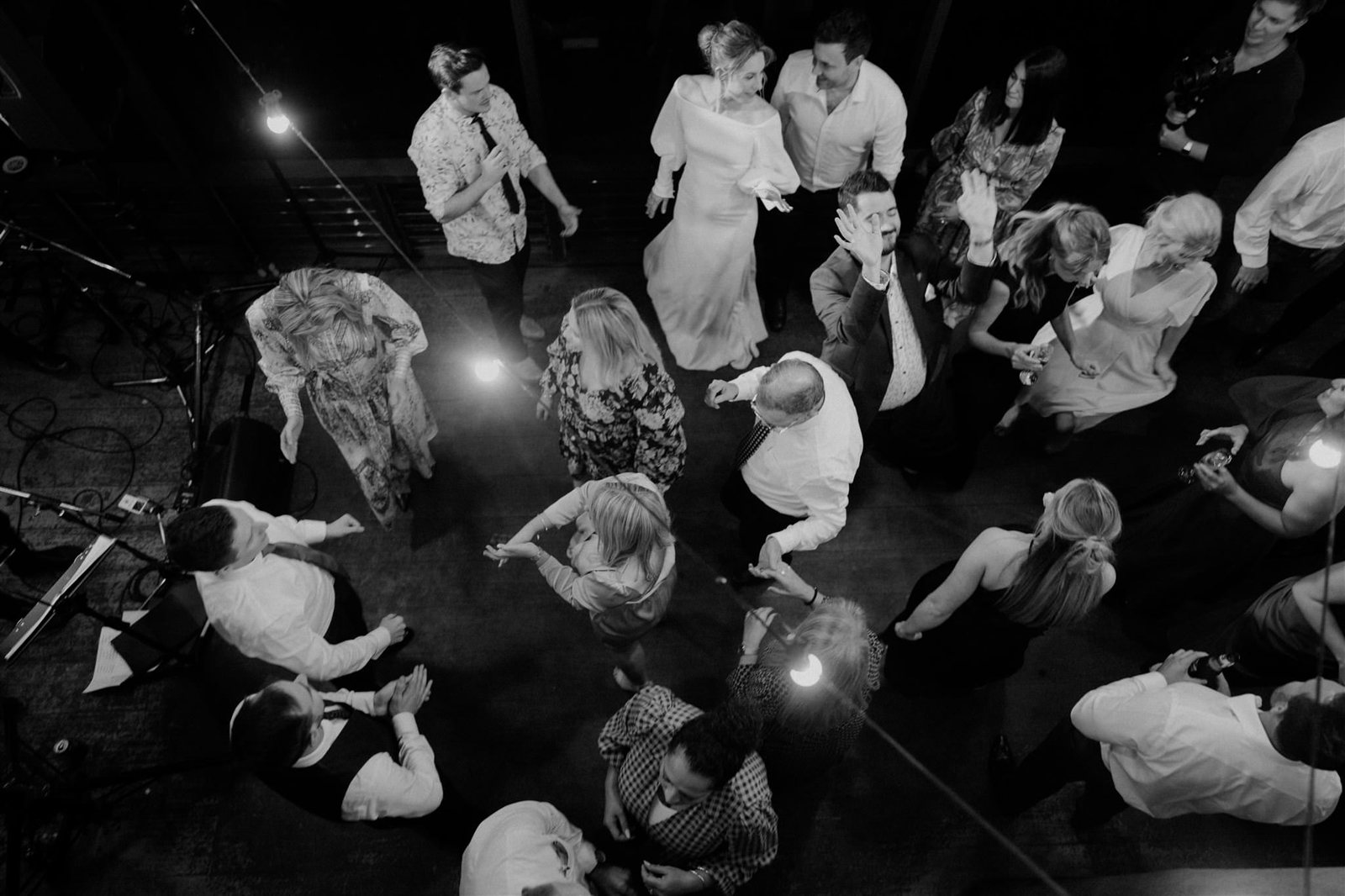 Black and white: a packed dance floor seen from above
